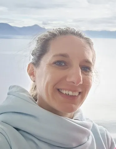 Celine with Alaskan sea in the background